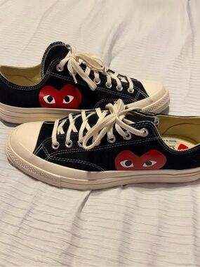 COMME DES GARÇONS X
Converse Black Sneakers w/Red
Heart Graphic